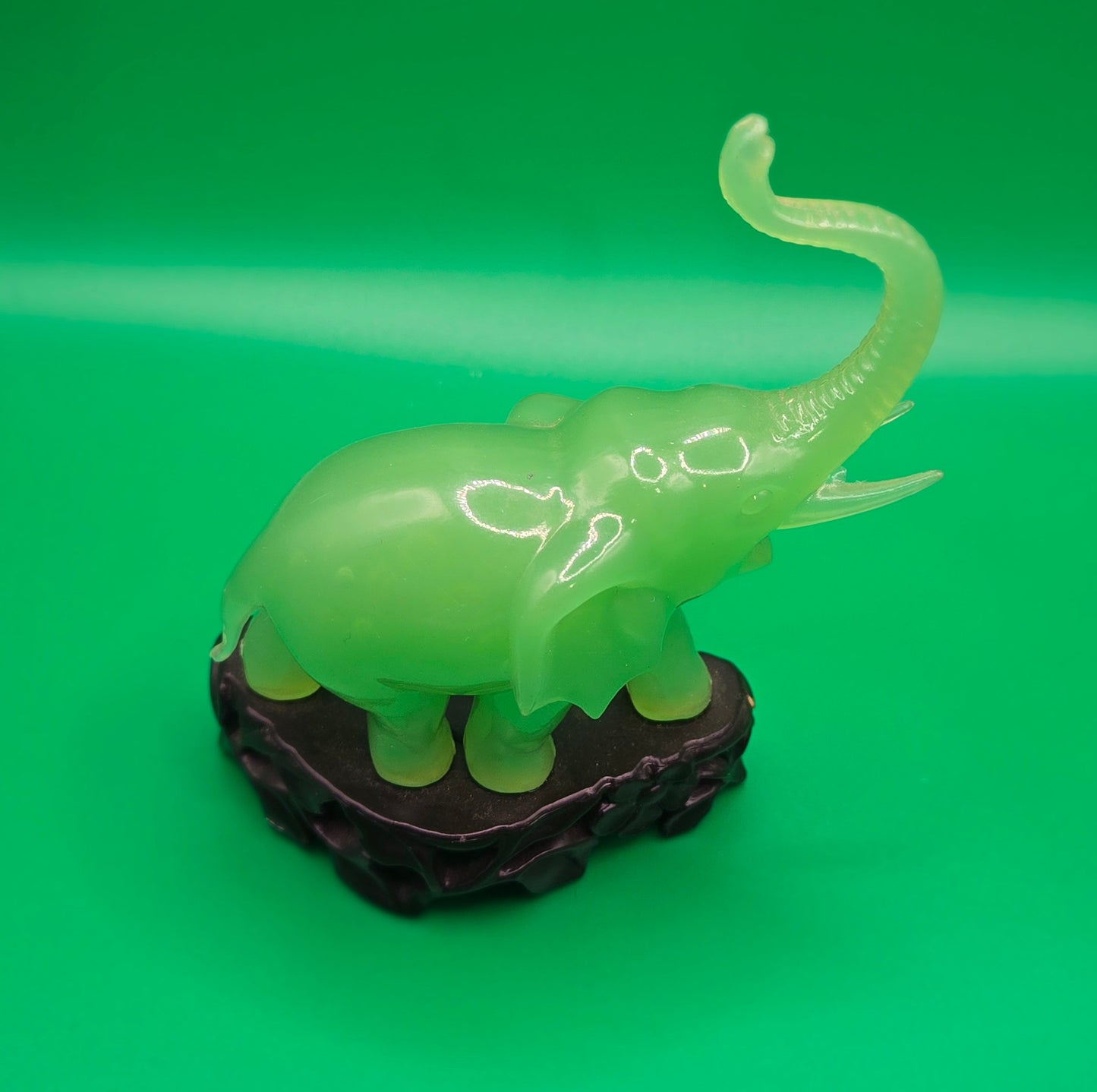 Green elephant figurine