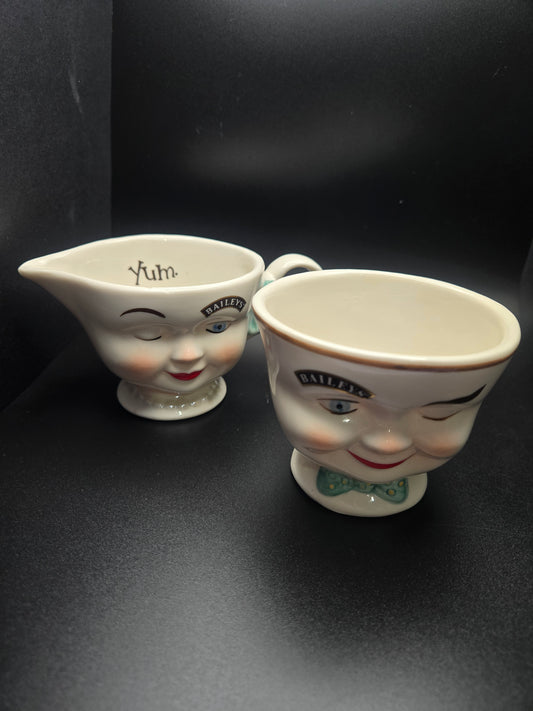Creamer and tea cup